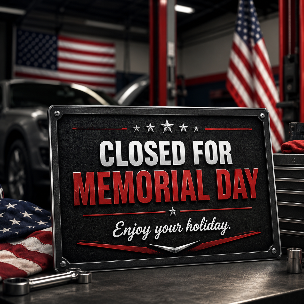 Closed for Memorial Day sign in auto shop